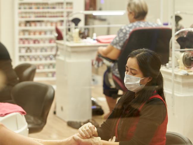 DARWIN, AUSTRALIA – MAY 15: A beautician works at Unforgettable Nail Salon in Darwin. Picture: Getty Images.