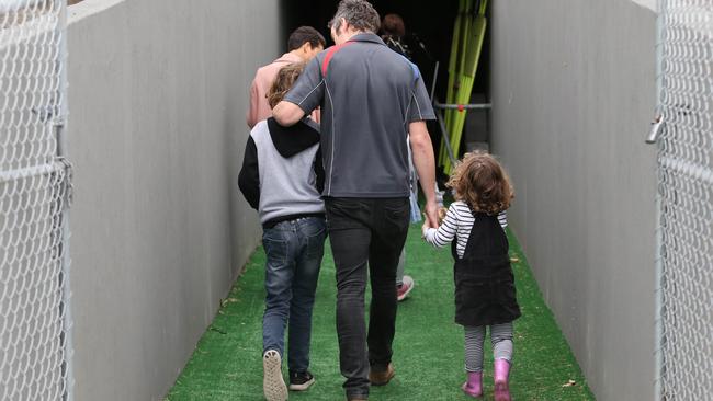 Bob Murphy walks off Whitten Oval after announcing his retirement.