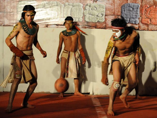 Ancient origins ... Honduras Maya Chorti and Guatemala’s Quirigua vie for the ball in Copan Ruinas. The ancient Mayan ball game is part of celebrations celebrating their ancient heritage. Source: AFP