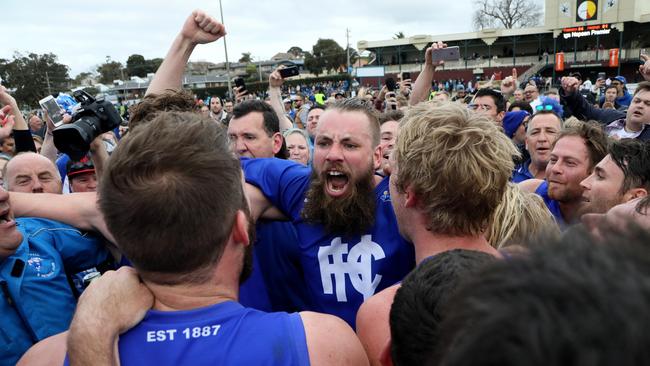 Hastings players celebrate with the premiership cup in 2016. Picture: Mark Dadswell