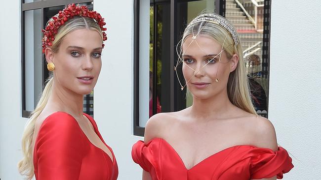 Princess Diana’s nieces Lady Amelia Spencer and Lady Eliza Spencer get ready to race in red. Picture: Josie Hayden