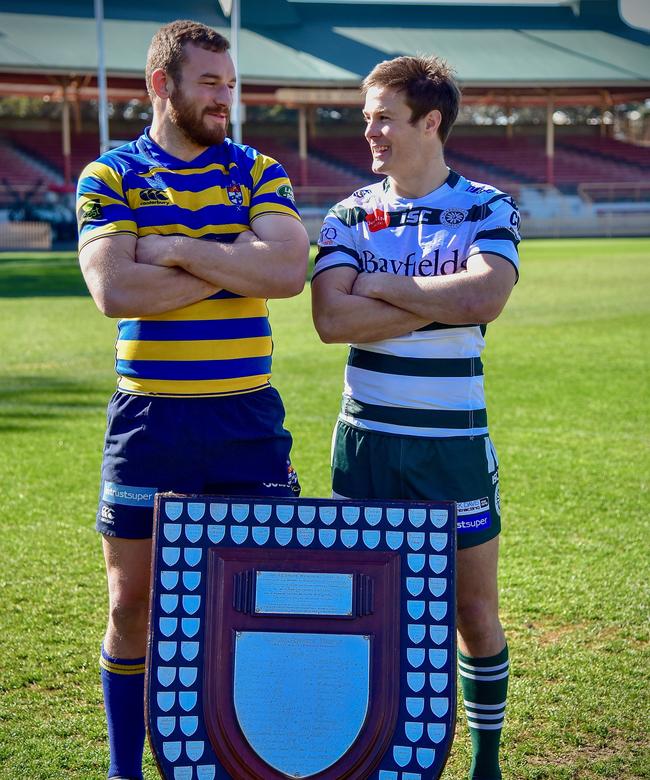 Sydney Uni captain Rohan O’Regan (left) and Warringah skipper Hamish Angus with the Shute Shield at North Sydney Oval ahead of Saturday’s grand final.