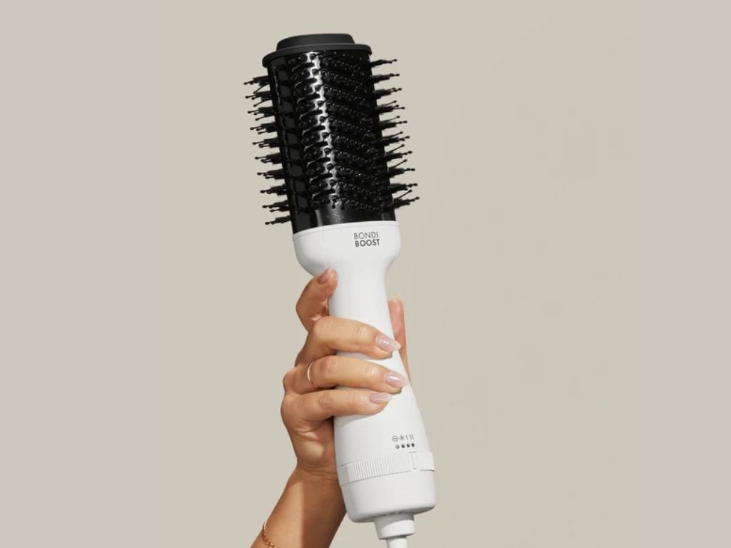 Her hair tool of choice? Abbie can’t go past the Bondi Boost Blowout Brush. Picture: Bondi Boost