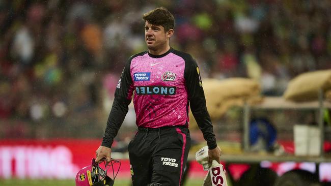 Sydney Sixers captain Moises Henriques was left seething after umpires called players off for a rain delay just six balls before the match would have garnered a result. Picture: Brett Hemmings/Getty Images.