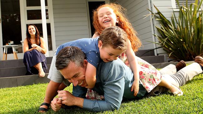 Patrick Casey with his wife Rose and kids Georgia, and Tommy at their Caringbah home.