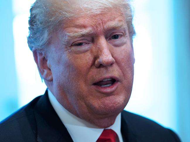 (FILES) In this file photo taken on March 1, 2018 US President Donald Trump speaks on steel and aluminum tariffs during a meeting with industry leaders in the Cabinet Room of the White House in Washington, DC. President Donald Trump said March 2, 2018 he plans to impose "reciprocal taxes" on imports from all trading partners to reduce the US trade deficit."When a country Taxes our products coming in at, say, 50%, and we Tax the same product coming into our country at ZERO, not fair or smart," Trump said, a day after announcing steep tariffs on steel and aluminum that has prompted threats of retaliation.  / AFP PHOTO / Mandel NGAN