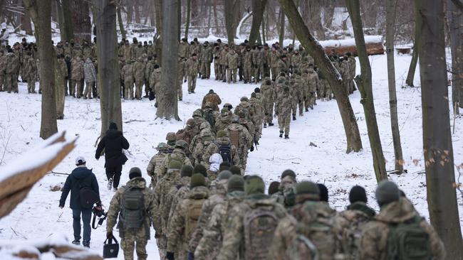 Civilian participants in a Kiev Territorial Defence unit train in a forest this month. Picture: Getty