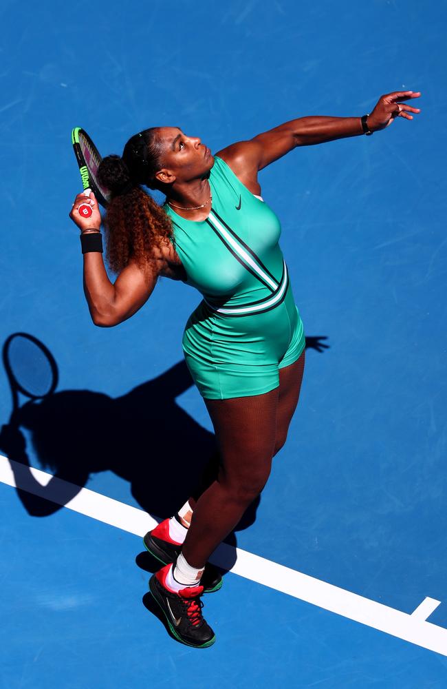 She teamed the hotpants onesie with a pair of black, green and red Nike runners. Picture: Getty Images