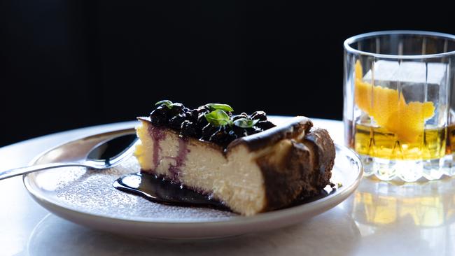 Basque cheesecake with blueberries and basil. Picture: David Kelly