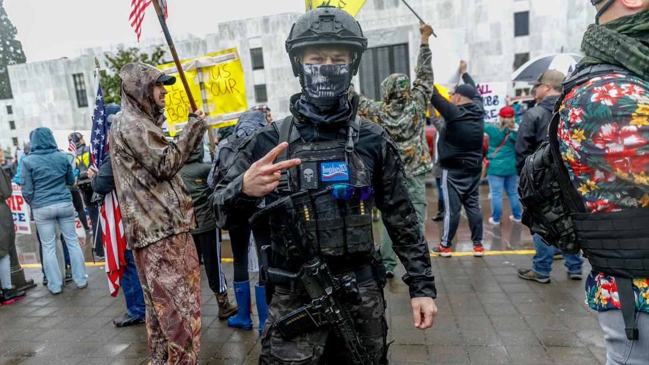 A man armed with an assault rifle protests in Salem, Oregon, against the state’s economic closures in the wake of the coronavirus. Picture: Getty Images