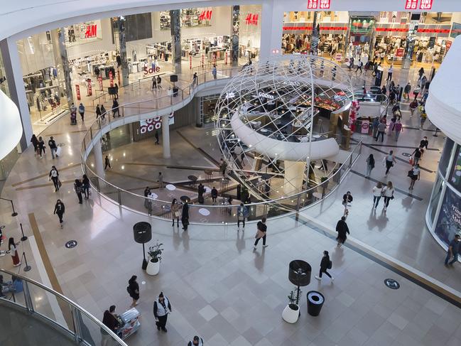 MELBOURNE, AUSTRALIA - DECEMBER 26: People shop during the Boxing Day sales at Chadstone the Fashion Capital on December 26, 2020 in Melbourne, Australia. Australians celebrate Boxing Day with many taking advantage of the post-Christmas sale prices in what is usually the busiest day of the year for retailers in Australia. Extra safety protocols have been introduced this year, due to the ongoing COVID-19 pandemic. (Photo by Naomi Rahim/Getty Images)