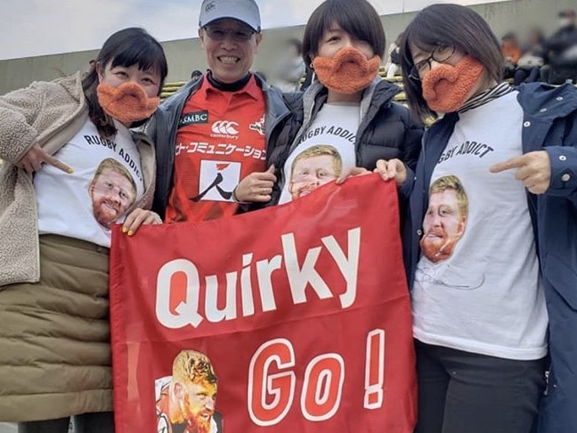 Sunwolves fans show their support for Ed Quirk. 