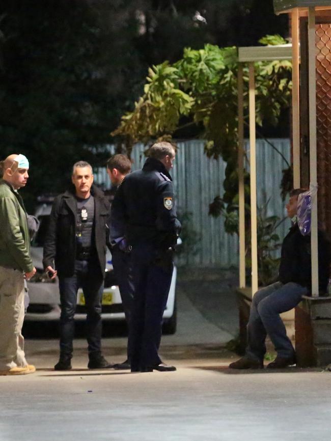 Police in Renown Ave during the string of raids. Picture: Steve Tyson