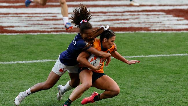 Australian 7s superstar Charlotte Caslick and her teammates could be based in Brisbane full-time.