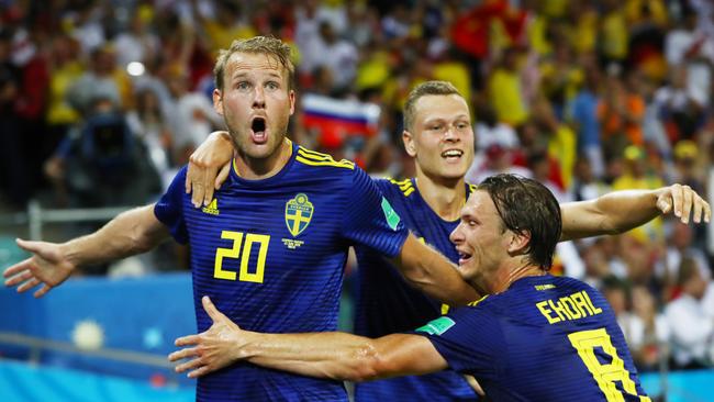 Sweden striker Ola Toivonen, left, celebrates his goal against Germany in the World Cup in June. Picture: Getty Images