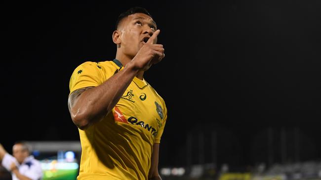 Israel Folau celebrates after scoring a try during the Rugby Championship match between the Wallabies and the Argentina Pumas in Canberra last September.