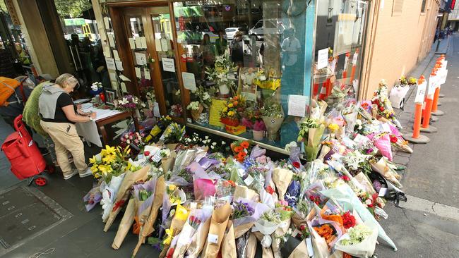 Flowers were laid in tribute for the passing of Sisto Malaspina in the attack. Picture: Michael Klein