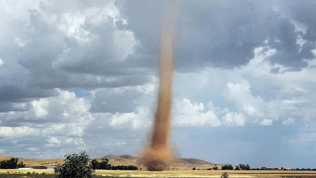 This was originally going to be a picture of lightning near Mt Bryan in South Australia, but when this towering dust devil appeared it stole the show. Picture: Jacob Elliot.