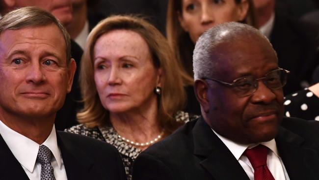 US Supreme Court Chief Justice John Roberts and Justice Clarence Thomas at the swearing-in ceremony of Brett Kavanaugh at the White House in Washington in 2018. Picture: AFP