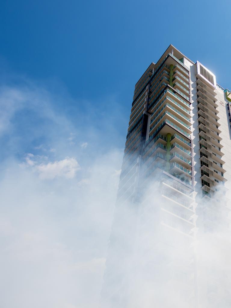 A fire has totally destroyed a house right next to DarwinÃ&#149;s tallest high-rise building, with the full range of emergency services rushing to the scene of the ferocious blaze. The fire on McMinn St is under investigation. picture: Che Chorley