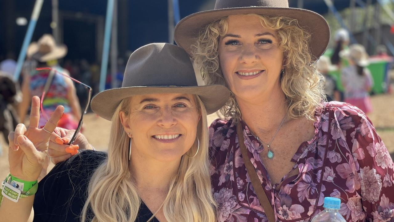 Dionne Bista and Sue Laws, from Sydney, enjoy day one of the 2024 Gympie Muster, at the Amamoor State Forest on August 22, 2024.