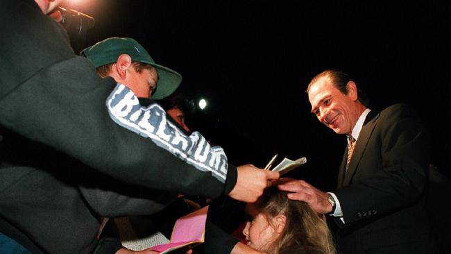 Actor Tommy Lee Jones, star of 1995 film "Batman Forever" signs autographs at film's premiere at Warner Brothers Movie World, Gold Coast, 24/06/95.