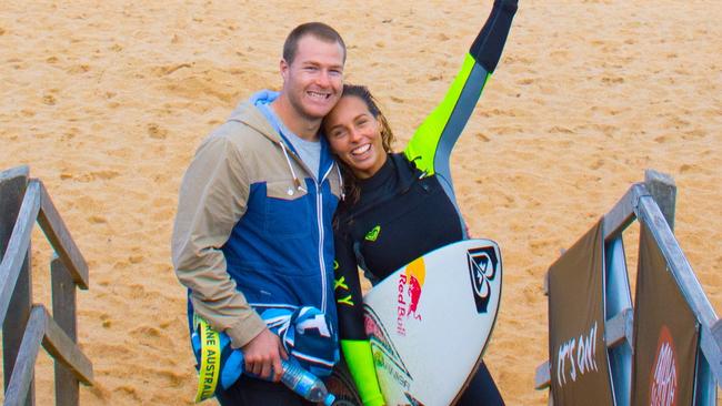 Trent Merrin with surfer Sally Fitzgibbons at Bell's Beach back in 2014.