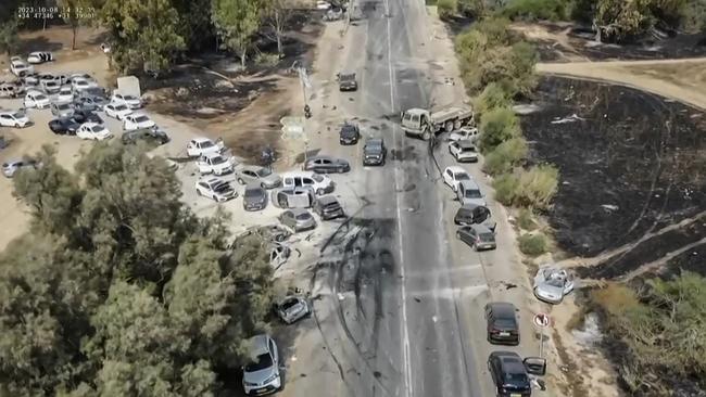 The aftermath of an attack on the Supernova music Festival by Palestinian militants, near Kibbutz Reim in the Negev desert in southern Israel on October 8. Picture: SOUTH FIRST RESPONDERS / AFP