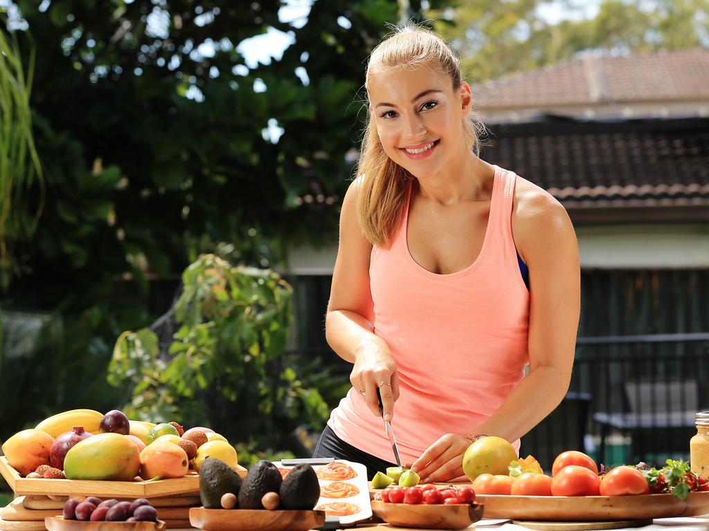 Carolena Kostas, 19, is about to start her second year of university and to save money she lives at home with her parents. She cooks and eats her own meals at home to save money. Picture: Craig Greenhill