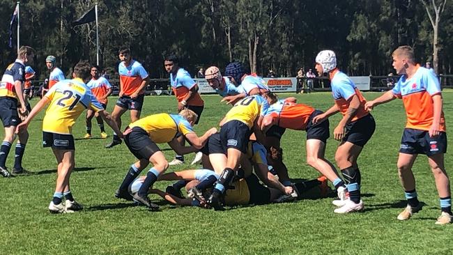 Action at the Gen Blue Cup at Camden Rugby Club.