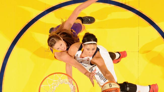 Natalie Achonwa Fever drives to the basket against Jennifer Hamson in a Los Angeles Sparks game. Pic: Getty Images)