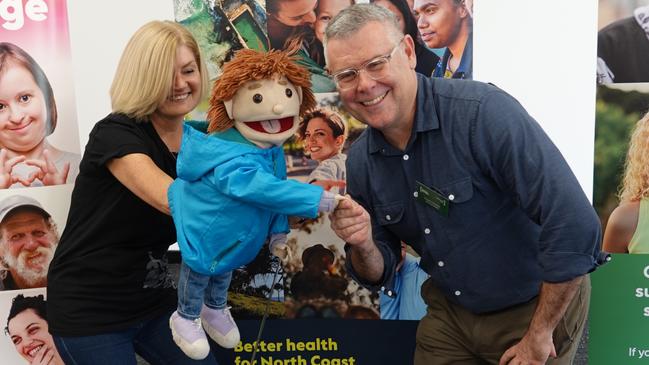 Play therapist Lisa Wilson, Jack the Flood Puppet, and Federal Minister for Emergency Management, Murray Watt at the launch of the government's $10 million Resilient Kids program.