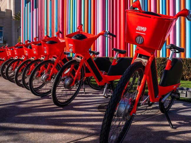 Uber has announced plans to bring its bright orange Jump e-bicycles to “multiple” cities in Australia. The vehicles have a top speed of more than 30km/h. Picture: Jennifer Dudley-Nicholson