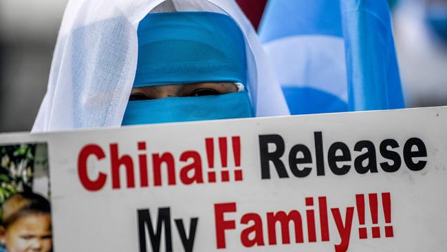 Members of the Uighur community outside China protest against their families’ imprisonment. Picture: Ozan Kose/AFP