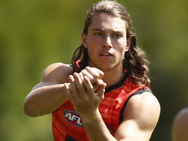 MELBOURNE, AUSTRALIA - JANUARY 21: Archie Perkins of the Bombers in action during an Essendon Bombers AFL media opportunity at The Hangar on January 21, 2021 in Melbourne, Australia. (Photo by Daniel Pockett/Getty Images)