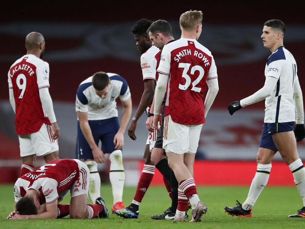 Erik Lamela leaves the field after being shown a red card following a foul on Kieran Tierney. (Photo by Nick Potts – Pool/Getty Images)