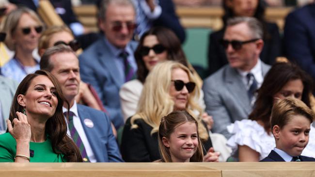 Kate, Charlotte and George in the stands. Picture: Adrian Dennis/AFP