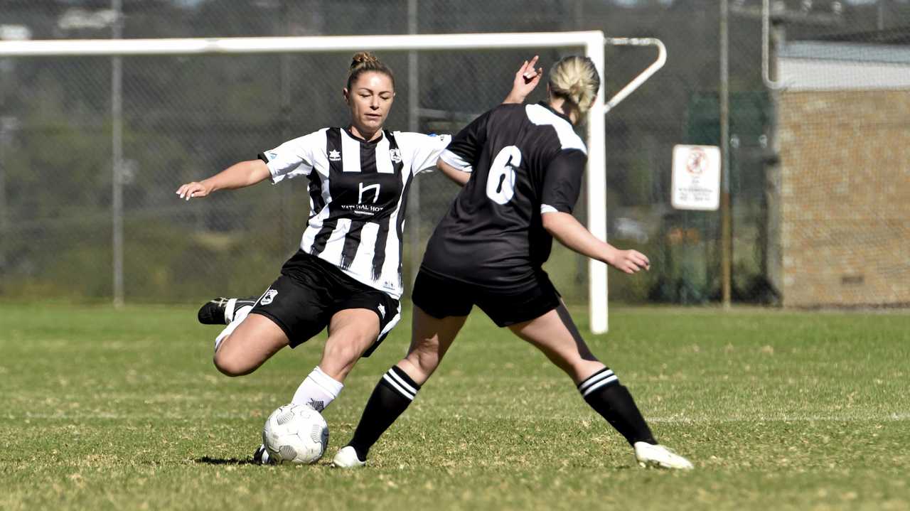 FITNESS FIGHT: Willowburn's Shannon Tyrell (left) is under an injury cloud and will be given up until today to prove her fitness for her side's grand final clash with Rockville tomorrow. Picture: Bev Lacey