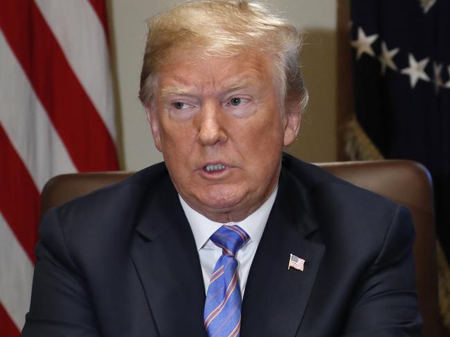 President Donald Trump pauses during his meeting with members of his Cabinet in the Cabinet Room of the White House in Washington, Wednesday, July 18, 2018. (AP Photo/Pablo Martinez Monsivais)