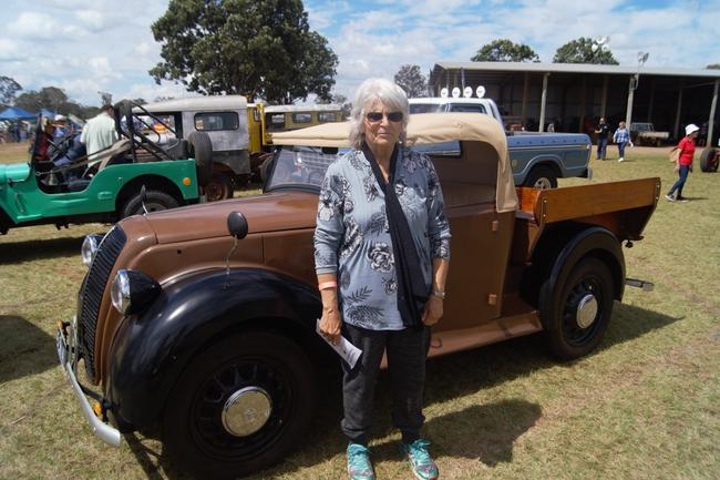 Joy Sollaye and a brown Morris 8 at Queensland Heritage Rally hosted by Kingaroy and District Vintage Machinery Club Inc