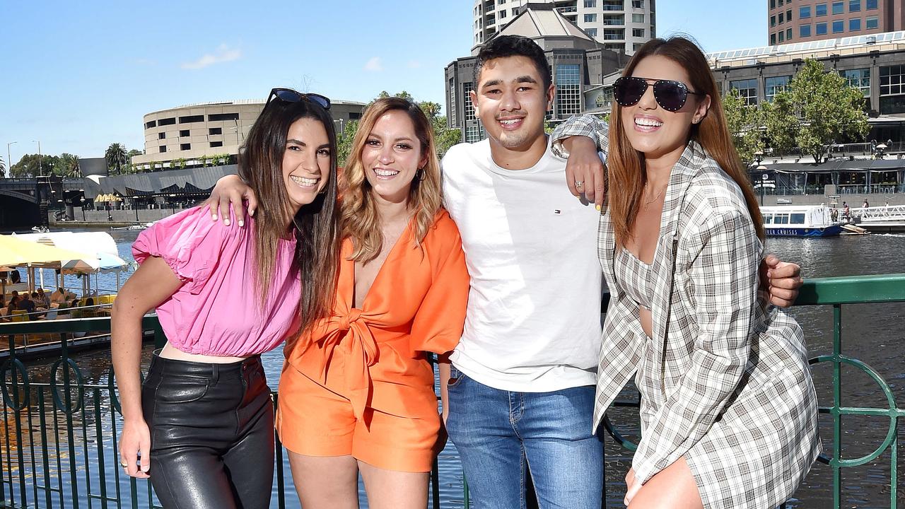 Vanessa Tsaples, Jacinta Ami, Michael Skey, and Melissa Le Clerc celebrating a birthday party, unperturbed by rising case numbers. Picture: Nicki Connolly