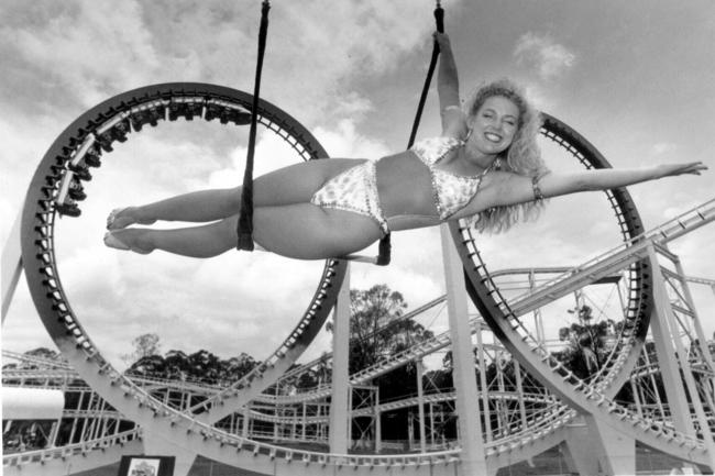 Trapeze artist Joanne De Gold with Thunderbolt ride in background at Dreamworld. 16/12/92, Pic: David Caird