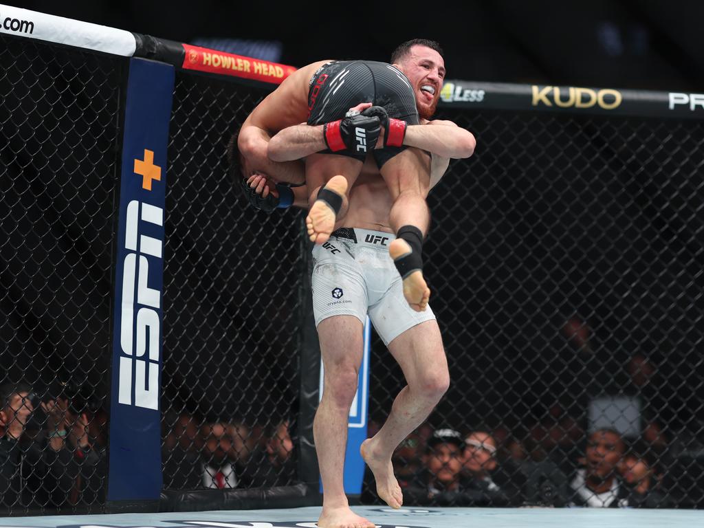 Dvalishvili picks up Henry Cejudo. Picture: Sean M. Haffey/Getty Images