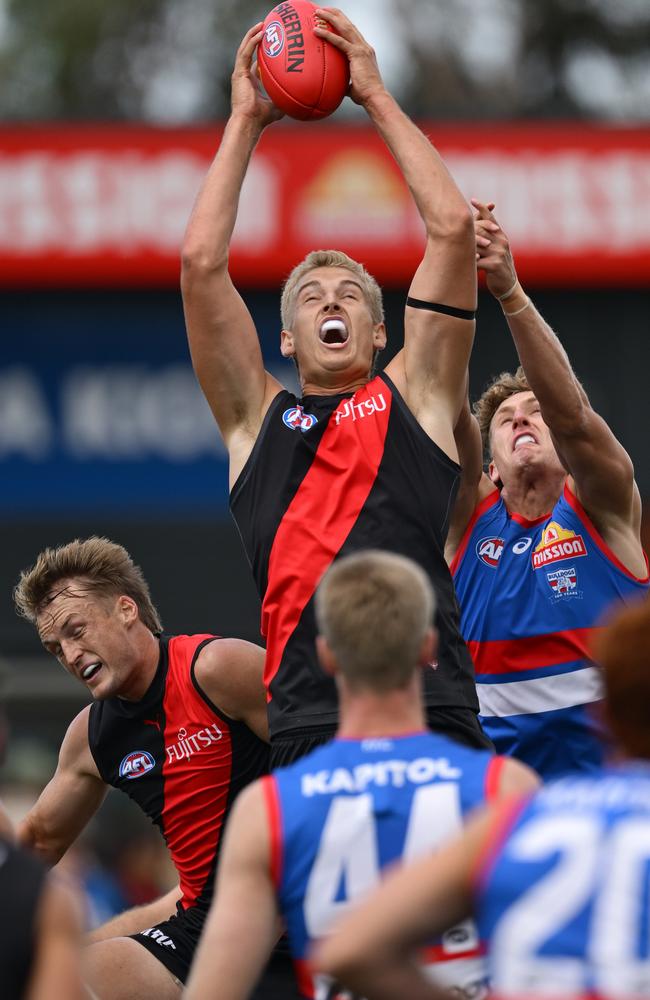 Nick Bryan rises high to mark. Picture: Quinn Rooney/Getty Images