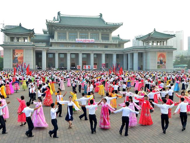 North Korean youth attend a dance party in Pyongyang to mark the 69th anniversary of North Korea’s national day. Picture: KCNA/AFP