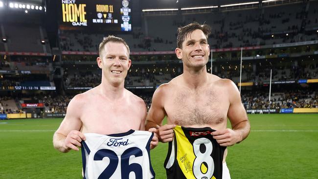 MELBOURNE, AUSTRALIA - MAY 12: Jack Riewoldt of the Tigers and Tom Hawkins of the Cats swap jumpers after the 2023 AFL Round 09 match between the Richmond Tigers and the Geelong Cats at the Melbourne Cricket Ground on May 12, 2023 in Melbourne, Australia. (Photo by Michael Willson/AFL Photos via Getty Images)