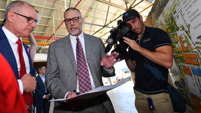 Former Premier Jay Weatherill (left) and then ProTom CEO Stephen Spotts (centre) during a visit to the Tonsley Innovation District at Clovelly Park in Adelaide, Thursday, March 8, 2018. Picture: David Mariuz/ AAP