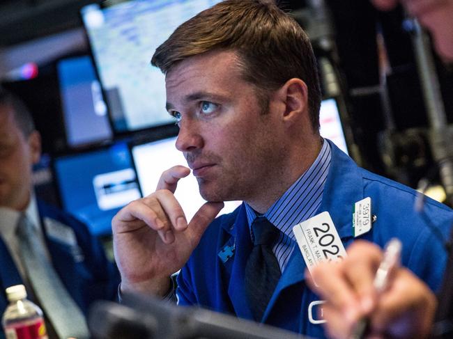 NEW YORK, NY - SEPTEMBER 17: A trader works on the floor of the New York Stock Exchange after the Federal Reserve chose not raise interest rates on September 17, 2015 in New York, United States. Traders had speculated for weeks over whether the fed would raise rates or keep them at near zero percent interest. Andrew Burton/Getty Images/AFP == FOR NEWSPAPERS, INTERNET, TELCOS & TELEVISION USE ONLY ==