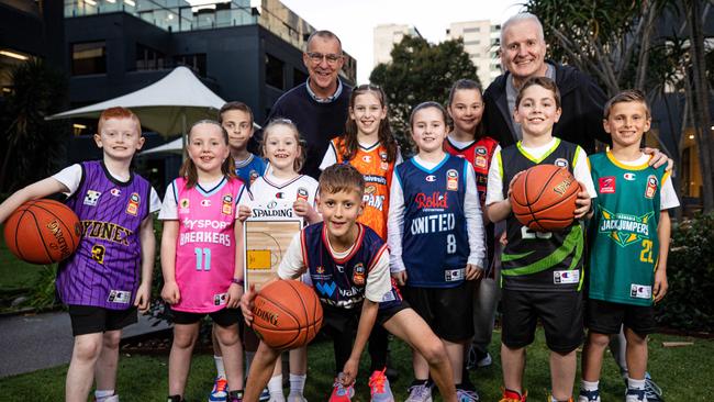 Aussie basketball great Andrew Gaze and his SEN on-air partner Andy Maher – and juniors from Yarrambat Phantoms Basketball Club – are getting behind the SuperCoach NBL Search for the Super Coach competition which will see one grassroots basketball club win up to $10,000. Picture: Mark Stewart