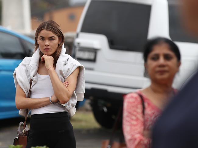 Bambi Northwood-Blyth checks out the auction action in Clovelly. Picture: David Swift